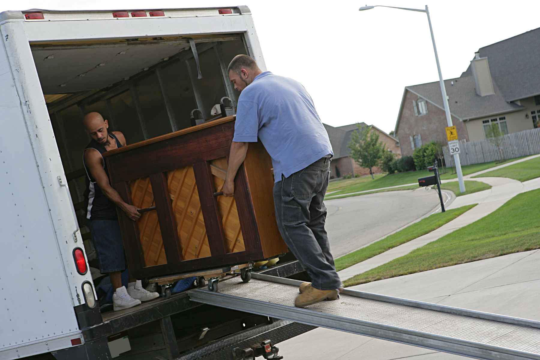 moving a piano with professional furniture movers